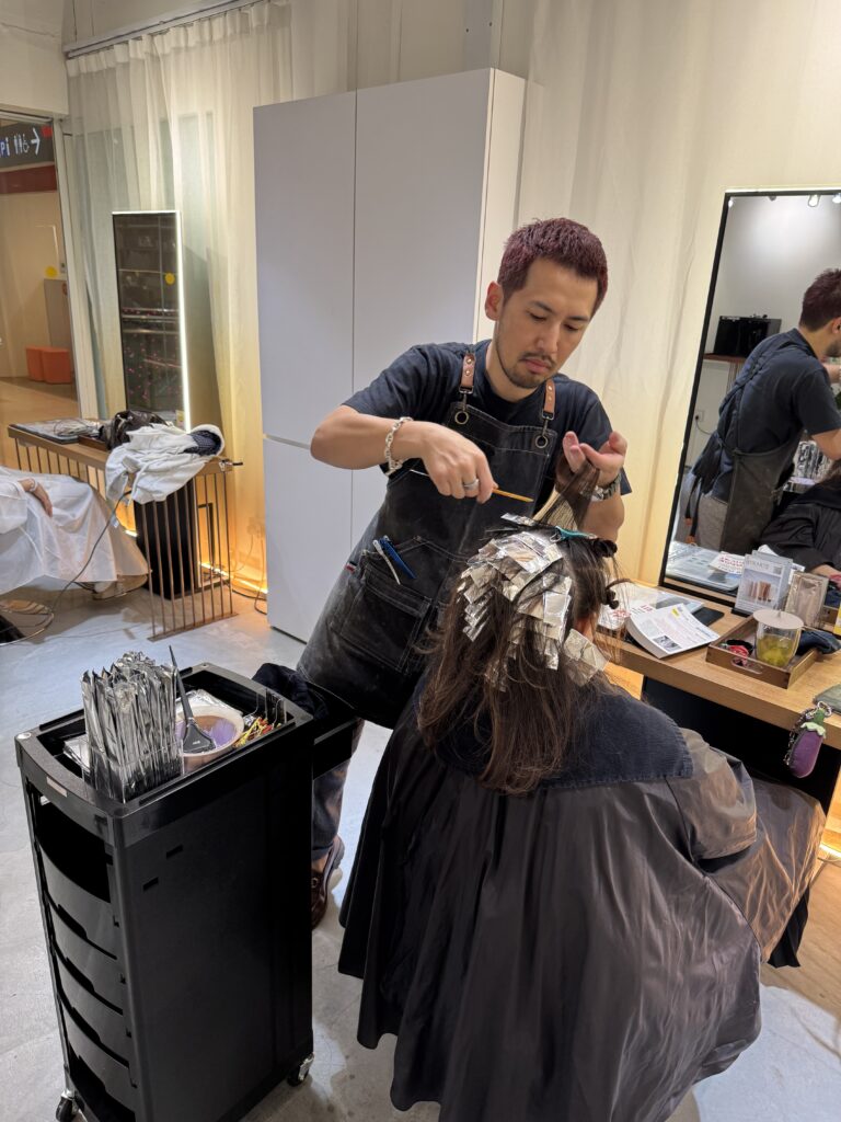 Grey blending highlights in progress by Colorist Ura at Colors Japanese Hair Salon Singapore