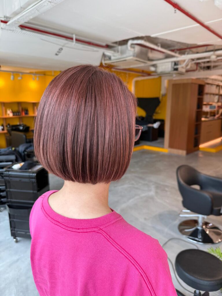 Pink Grey Blending Highlights Bob | Japanese Hair Salon Singapore 1 Pink grey blending highlights on a compact short bob at Colors Japanese Hair Salon Singapore near Clarke Quay, soft white hair blending with low-damage plex color for shine and dimension