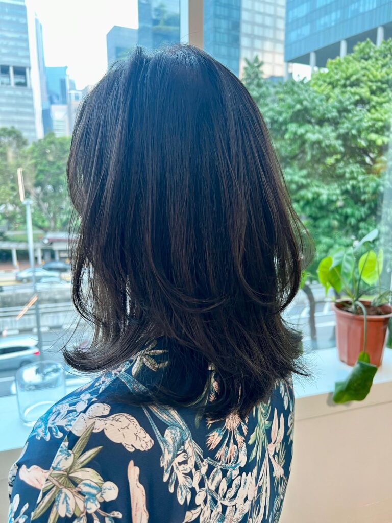 Medium Digital Perm | Japanese Hair Salon Singapore 1 Medium layered digital perm at Colors Japanese Hair Salon Singapore, creating soft movement and lightweight texture even on natural black straight hair.