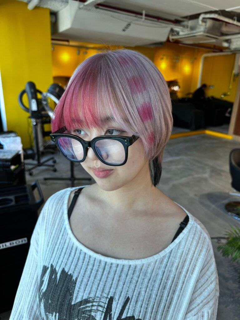 silver white and pink low-damage highlights at Colors Japanese Hair Salon Singapore, Japanese hair salon near Clarke Quay, Singapore – short bob design with clean neckline and soft shine