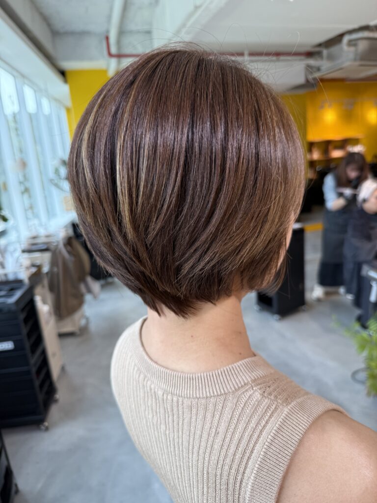 Colors Japanese Hair Salon Singapore short haircut with gold brown grey blending highlights for white hair, clean neckline and balanced volume