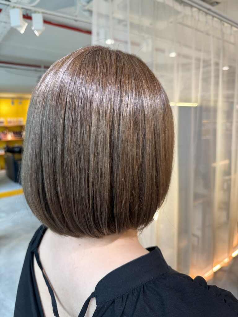 Colors Japanese Hair Salon Singapore bob haircut with bright white hair color without bleach, natural grey coverage and clean back silhouette