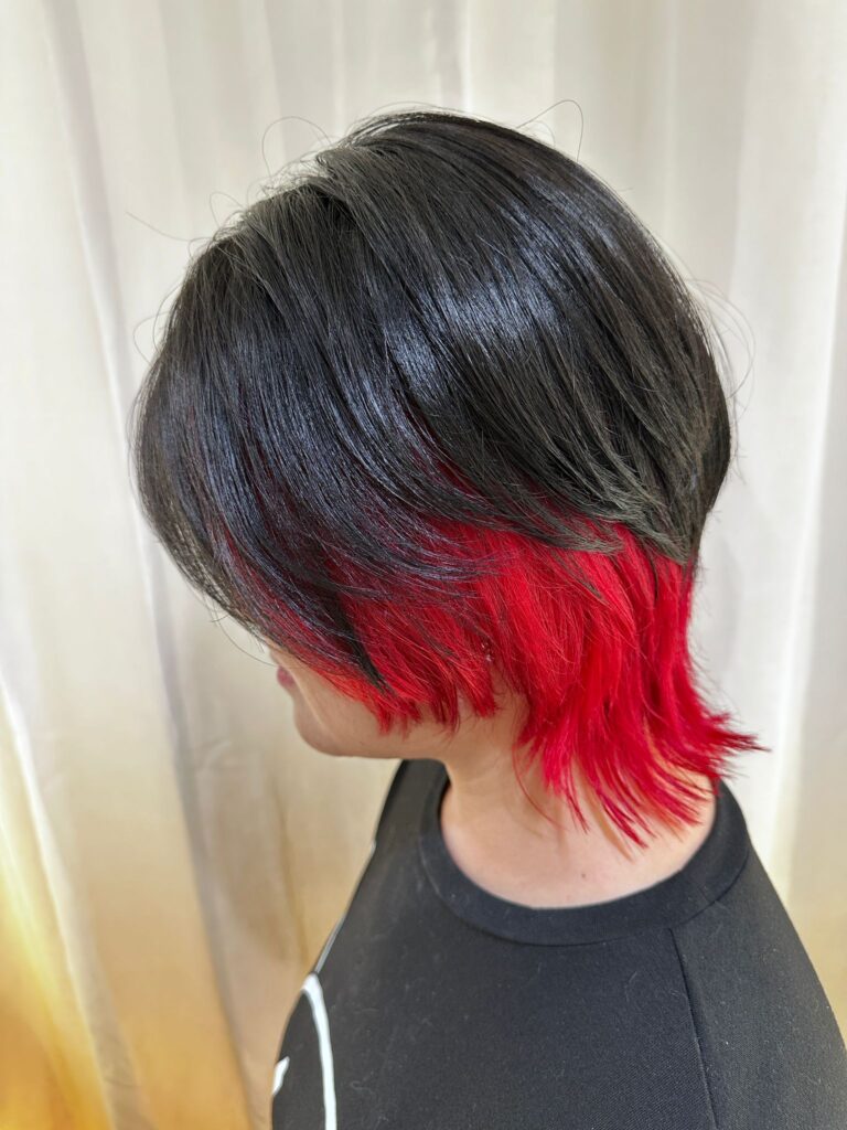 Wolf Cut × Inner Red Color | Japanese Hair Salon Singapore 1 Wolf cut with vivid red inner color on natural black hair at Japanese hair salon Singapore, bold contrast design color