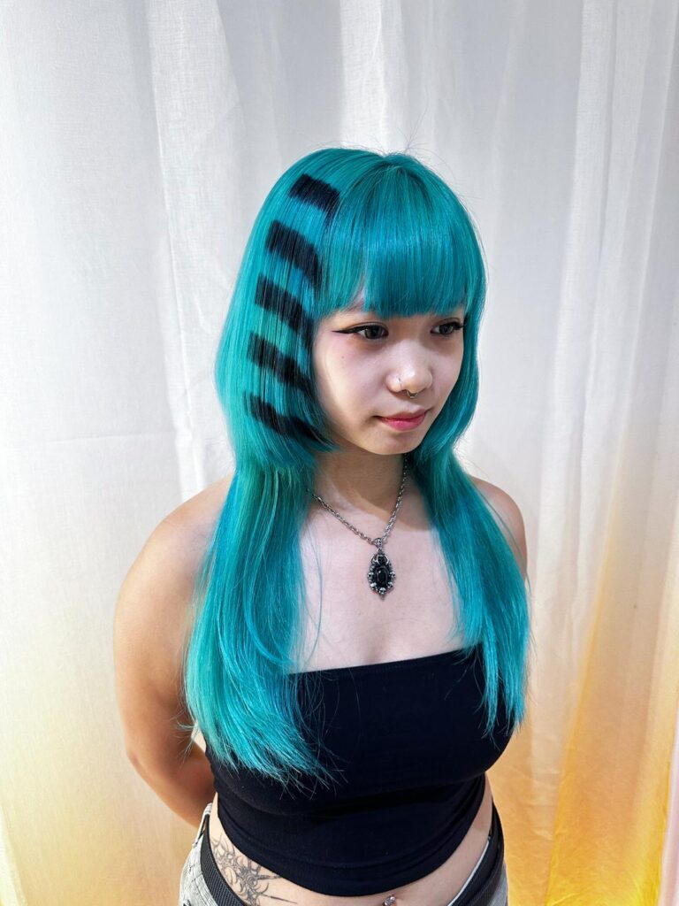 Neon Green Stripe Bangs Design Color | Japanese Hair Salon Singapore 1 Neon green full bleach stripe design on long layered hair with black removable stripes at Japanese hair salon Singapore near Clarke Quay