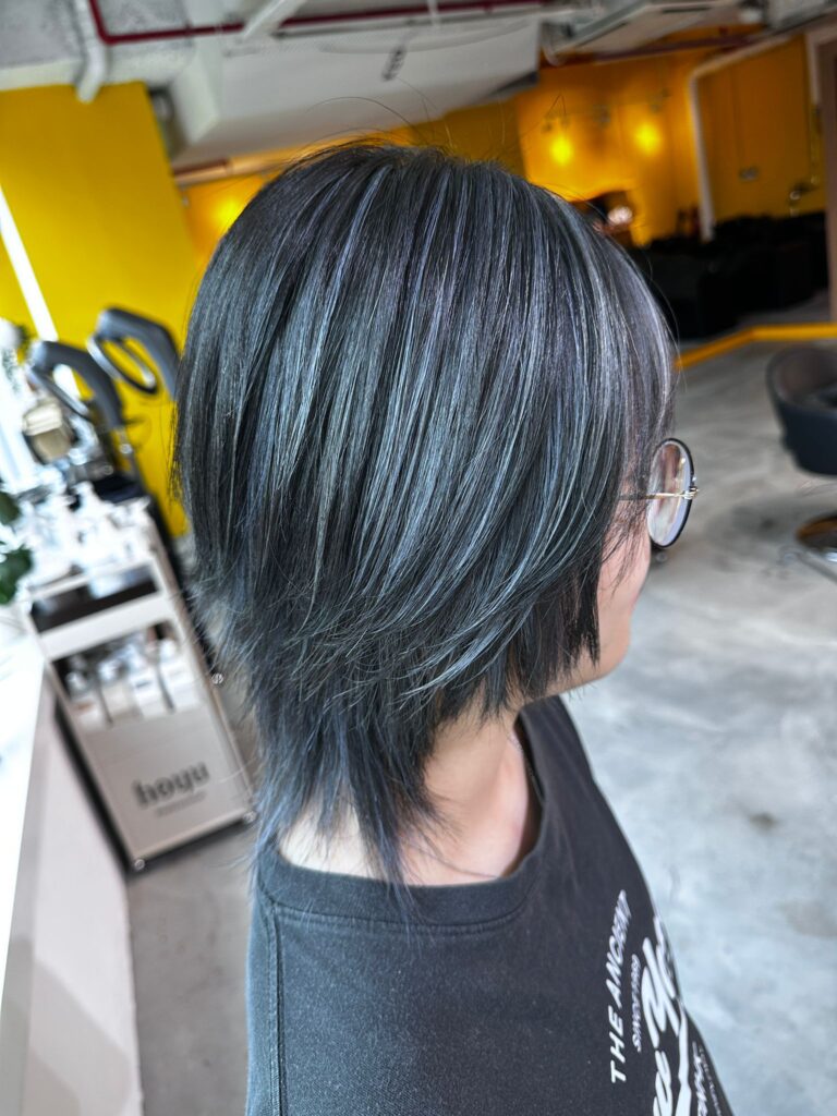 Silver highlight medium wolf haircut with bleach and plex treatment by Creative Manager Issey at Colors Japanese Hair Salon Singapore near Clarke Quay Chinatown Singapore