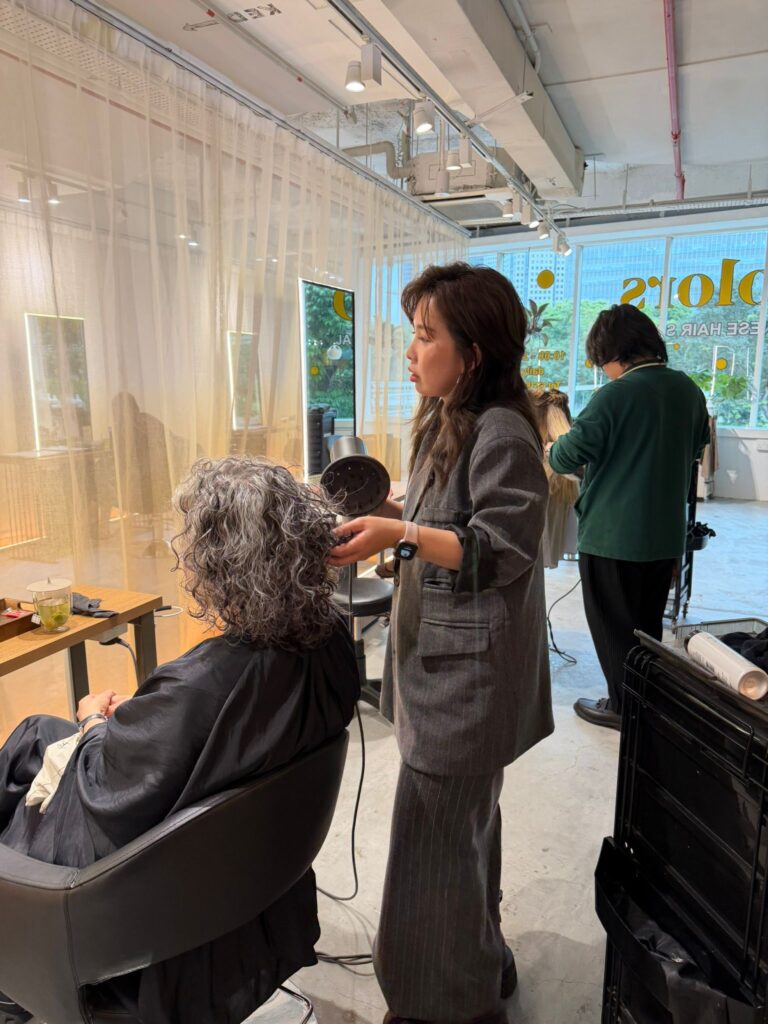 Volume perm styling creating natural lift and soft movement by Creative Stylist Carmen at Colors Japanese Hair Salon Singapore near Clarke Quay Chinatown Singapore