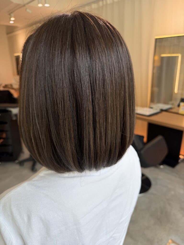 Ash brown bob for grey coverage at Colors Japanese Hair Salon Singapore, natural grey hair coverage with glossy ash brown hair color and smooth bob haircut with keratin treatment recommendation
