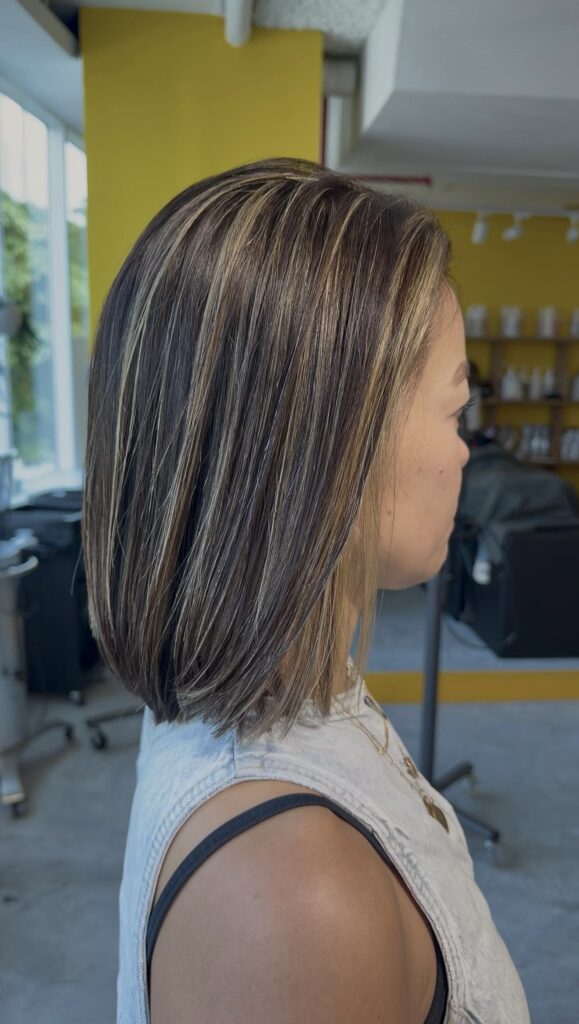 Contrast highlight bob with bright highlights and dark base color by Senior Stylist Sylvia at Colors Japanese Hair Salon Singapore.