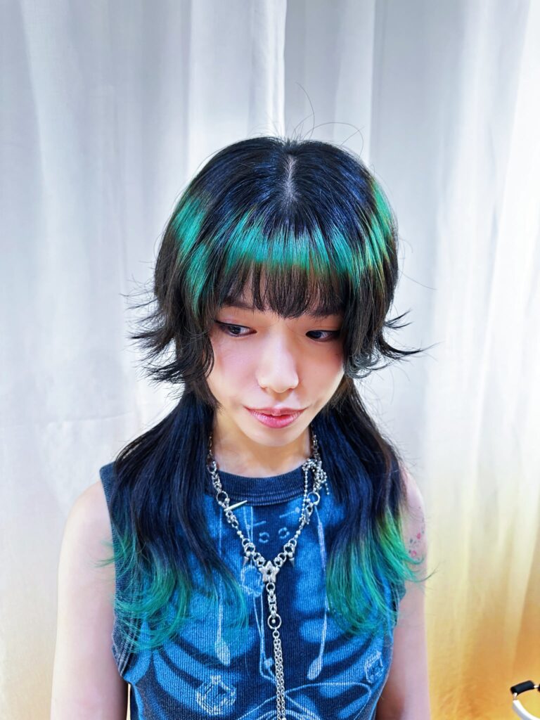 Jellyfish Cut & Emerald Green Bleach Design | Japanese Hair Salon Singapore 1 Jellyfish Cut with Emerald Green Bleach Design at Japanese Hair Salon Singapore. High layer haircut with ring color, dip color, Plex bleach, and face-framing bangs.
