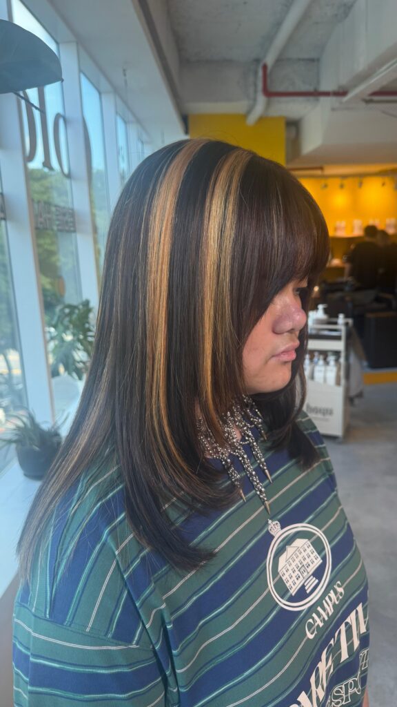 Japanese design highlights with low-damage Plex bleach by Stylist Sylvia at Colors Japanese Hair Salon Singapore, creating bold contrast and natural dimension.