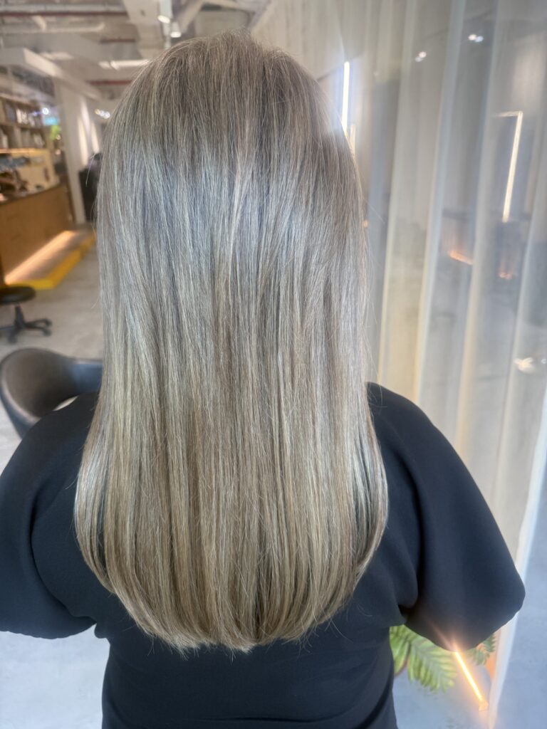 Grey Blending Blonde Highlights with fine bleach highlights by Stylist Satsuki and Colorist Ura at Colors Japanese Hair Salon Singapore.