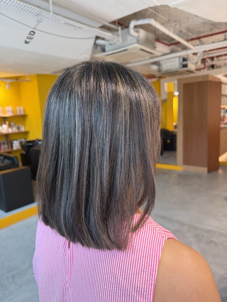 Grey Blending Highlights Bob Singapore | Japanese Hair Salon Singapore 1 Grey blending highlights on a classic bob haircut in Singapore using natural grey hair, fine bleach highlights, and Plex technology for a low-maintenance grey coverage at a Japanese hair salon.