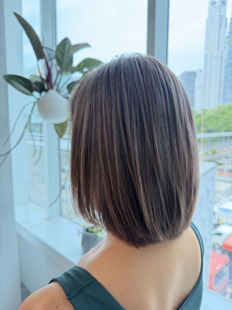 Grey Blending correction with natural highlight adjustment by Colorist Ura at Colors Japanese Hair Salon Singapore, correcting thick highlights into a softer, more natural finish.