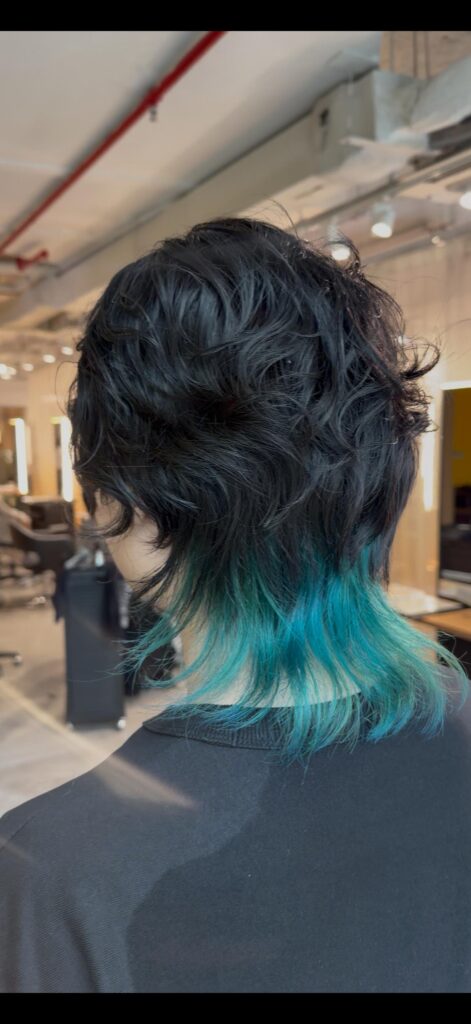 Japanese wolf cut perm with turquoise nape bleach color by Stylist Sylvia at Colors Japanese Hair Salon Singapore.