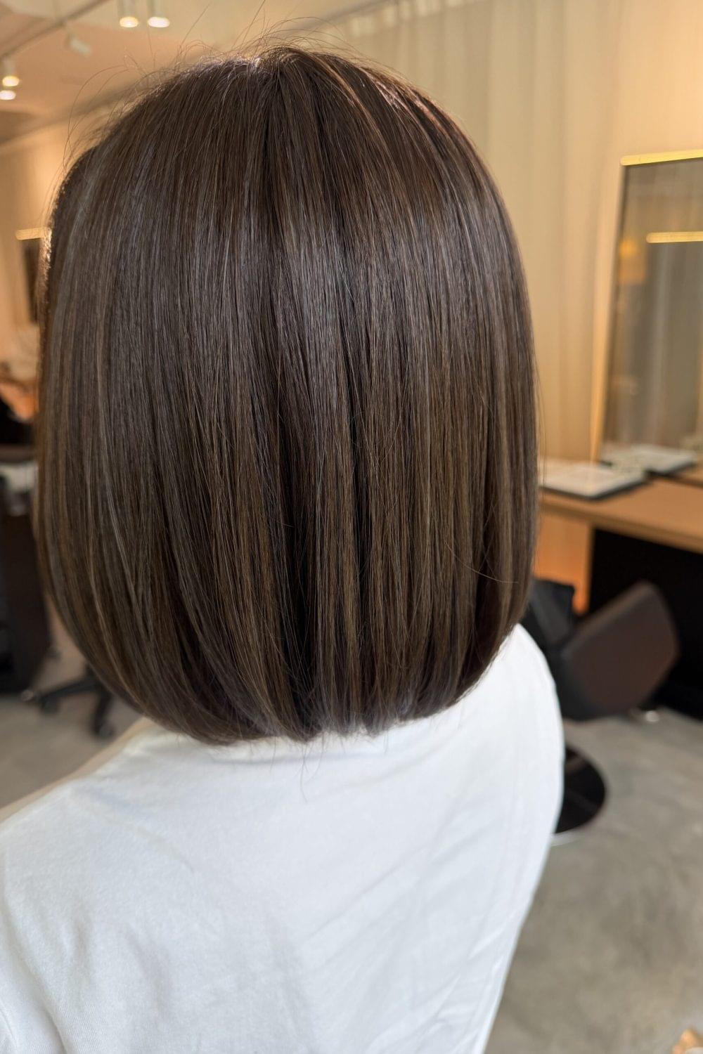 Ash brown bob for grey coverage at Colors Japanese Hair Salon Singapore, natural grey hair coverage with glossy ash brown hair color and smooth bob haircut with keratin treatment recommendation