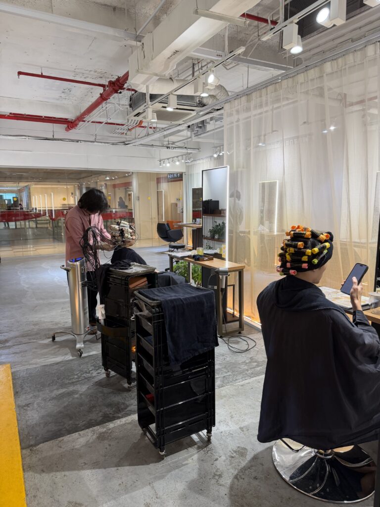 Perm and colour services in progress at Colors Japanese Hair Salon Singapore, Japanese stylists performing low-damage chemical treatments.