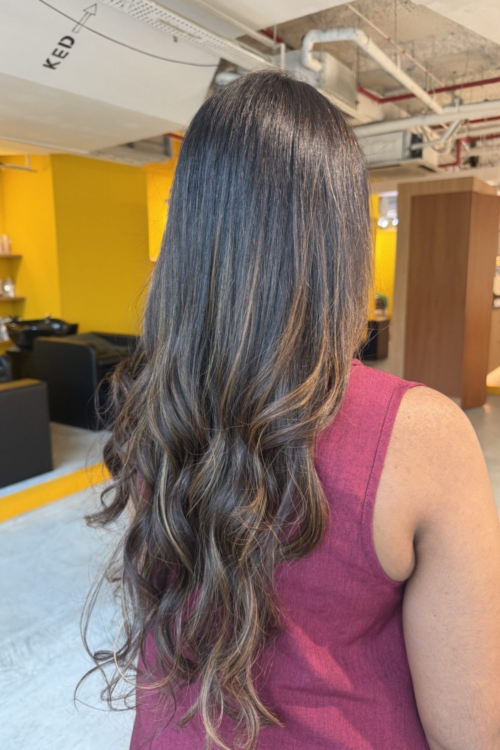 Super long layered hair with dark brown grey coverage retouch, surface layers for soft volume, and occasional bleach highlights maintenance to keep brightness, finished with Plex-supported color, Hoyu treatment and scalp cleansing spa in Singapore.