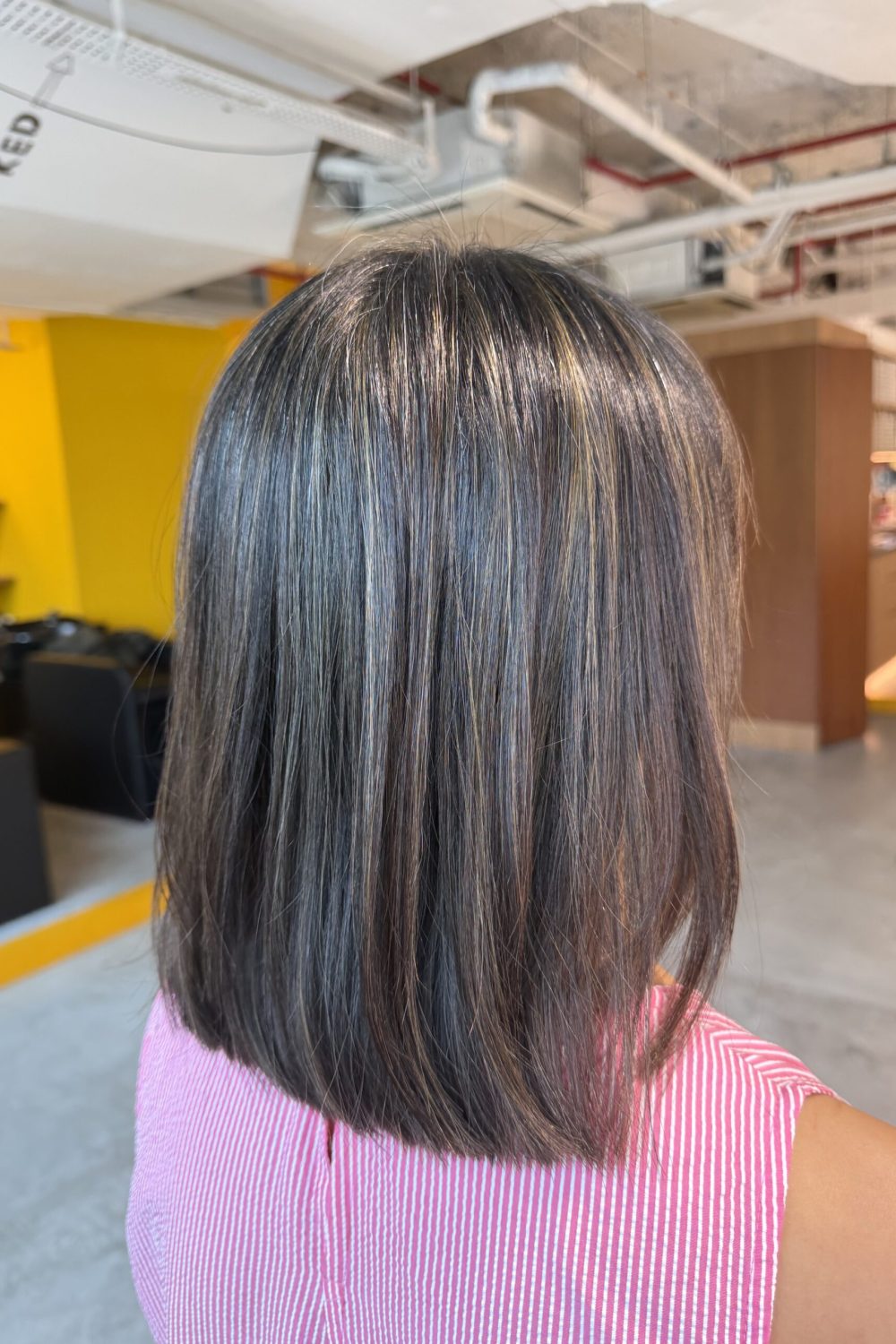 Grey blending highlights on a classic bob haircut in Singapore using natural grey hair, fine bleach highlights, and Plex technology for a low-maintenance grey coverage at a Japanese hair salon.