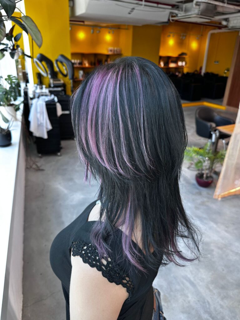 Pale purple design color with care bleach on medium layered wolf haircut by stylist Issey at Colors Japanese Hair Salon Singapore