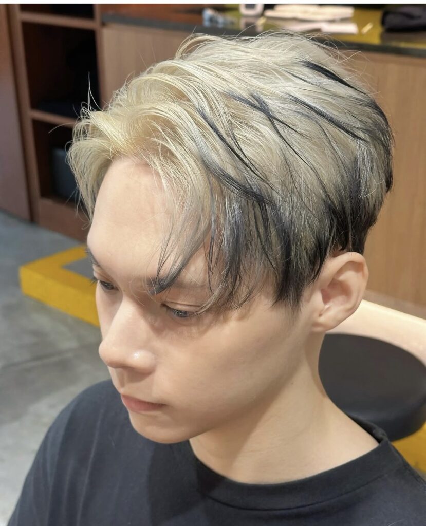 Men’s blonde and black contrast design color with layered texture at Colors Japanese Hair Salon Singapore.