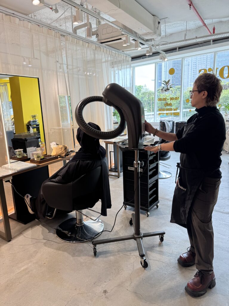 Perm heating process for natural volume at Colors Japanese Hair Salon Singapore near Clarke Quay and Havelock Road