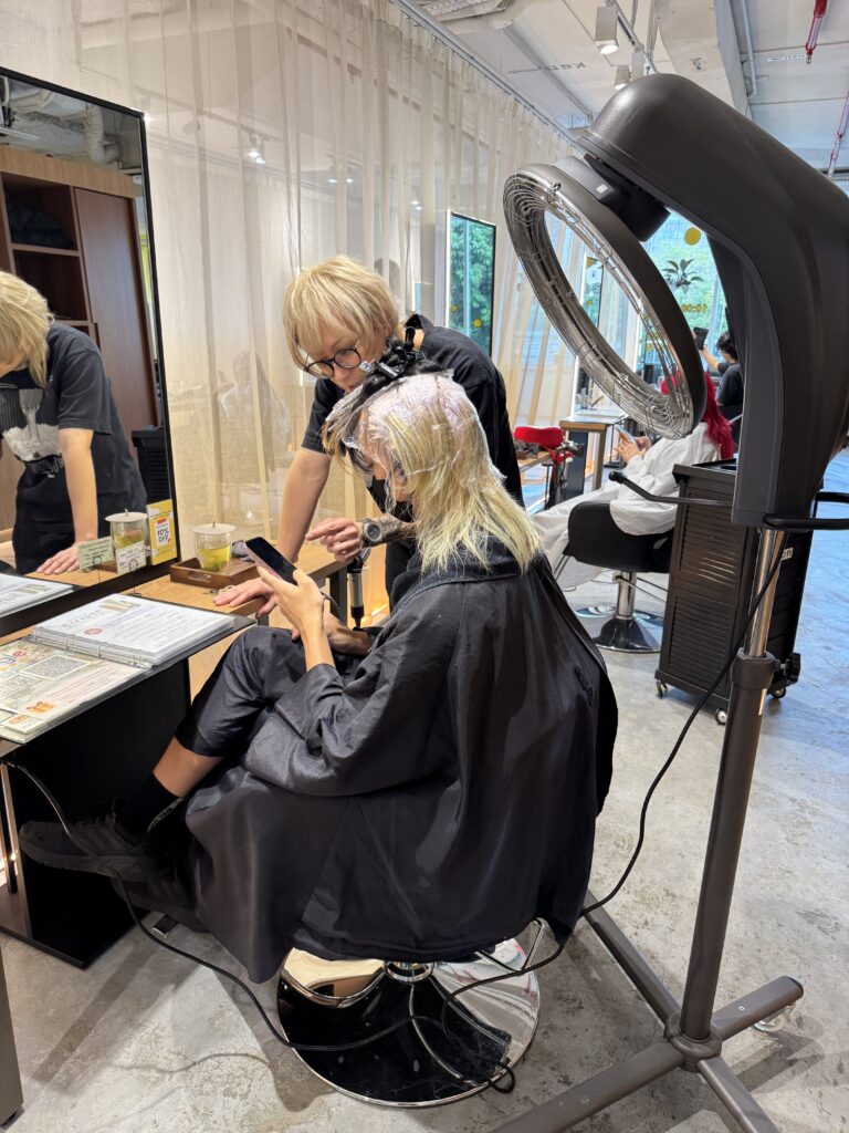 Detailed Japanese-style hair consultation at Colors Japanese Hair Salon Singapore near Clarke Quay and Havelock Road, focusing on haircut, hair color, straight perm, and long-term hair goals.