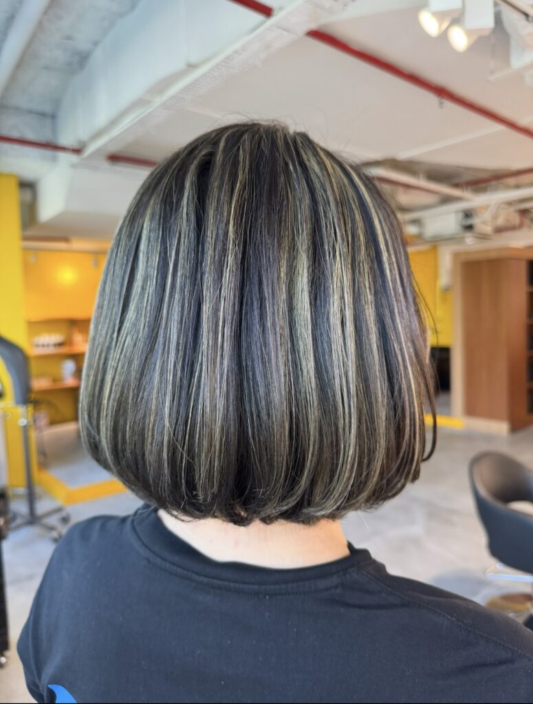 Grey Blending Singapore: Fine Highlights Japanese Bob Cut for White Hair (Low-Maintenance) 1 Grey blending Singapore with fine highlights on a polished Japanese bob haircut, creating soft white-hair blending and natural shine at Colors Japanese Hair Salon Singapore near Clarke Quay MRT, Chinatown, Havelock Road