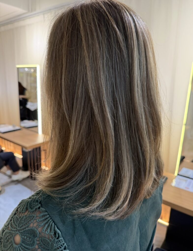 Grey Blending Beige in Singapore: Soft, Skin-Flattering Highlights for White Hair 1 Grey blending beige highlights in Singapore — soft skin-flattering beige tone for white hair blending with natural dimension at Colors Japanese Hair Salon Singapore near Clarke Quay MRT, Chinatown and Robertson Quay