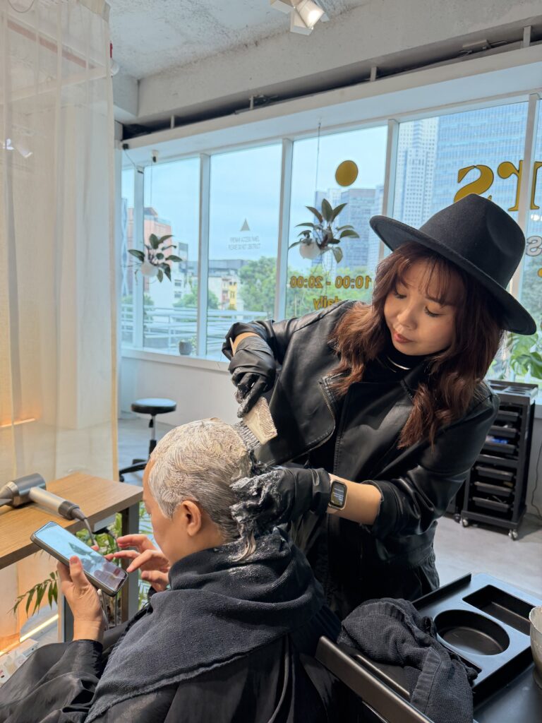 Plex color session for grey hair coverage with Marbb micro-bubble scalp cleansing at Colors Japanese Hair Salon Singapore near Clarke Quay MRT and Chinatown, delivering low-damage shine and even color results for white hair.