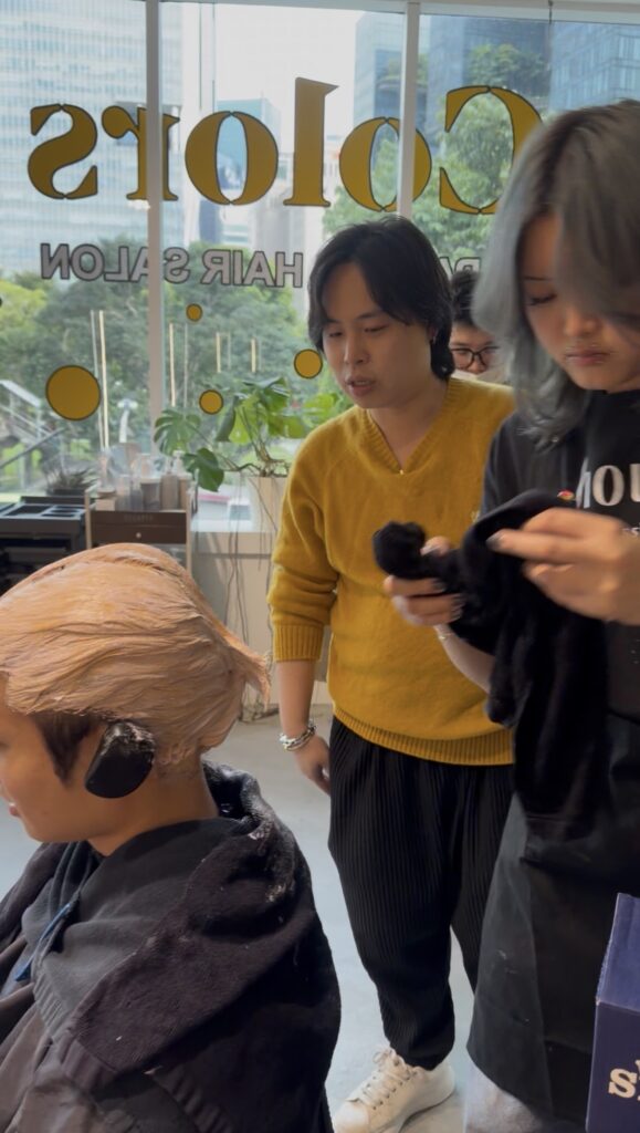 Black dye to blonde transformation in progress at Colors Japanese Hair Salon Singapore near Clarke Quay MRT Chinatown Havelock Road, stylist Ritsuki bleaching step-by-step for low-damage blonde and color correction Singapore