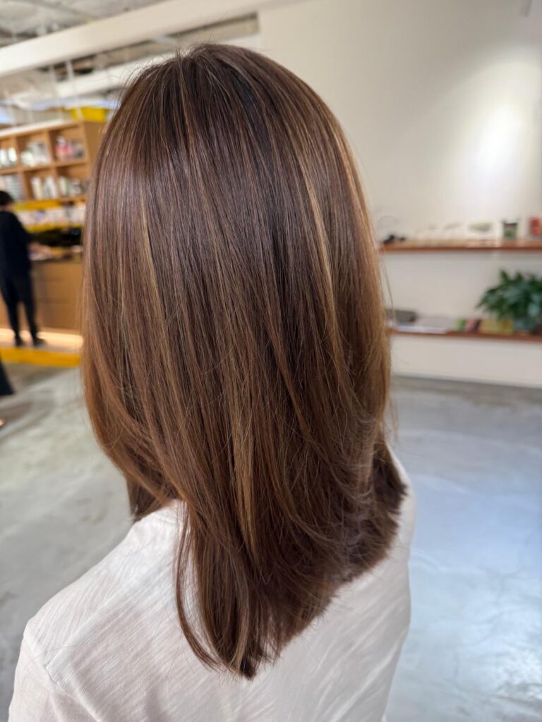 Beige highlights long layer haircut Singapore natural beige hair color at Colors Japanese Hair Salon Singapore near Clarke Quay MRT Chinatown