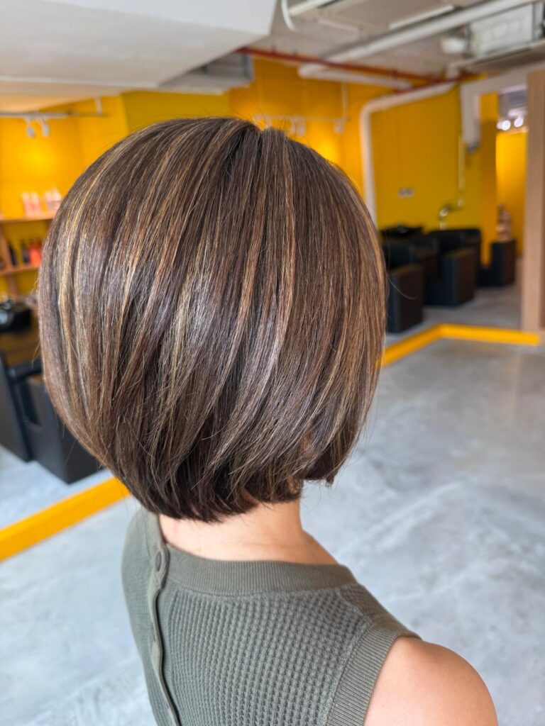 Grey blending highlights with short haircut at Colors Japanese Hair Salon Singapore near Clarke Quay creating natural white hair blending and soft dimension
