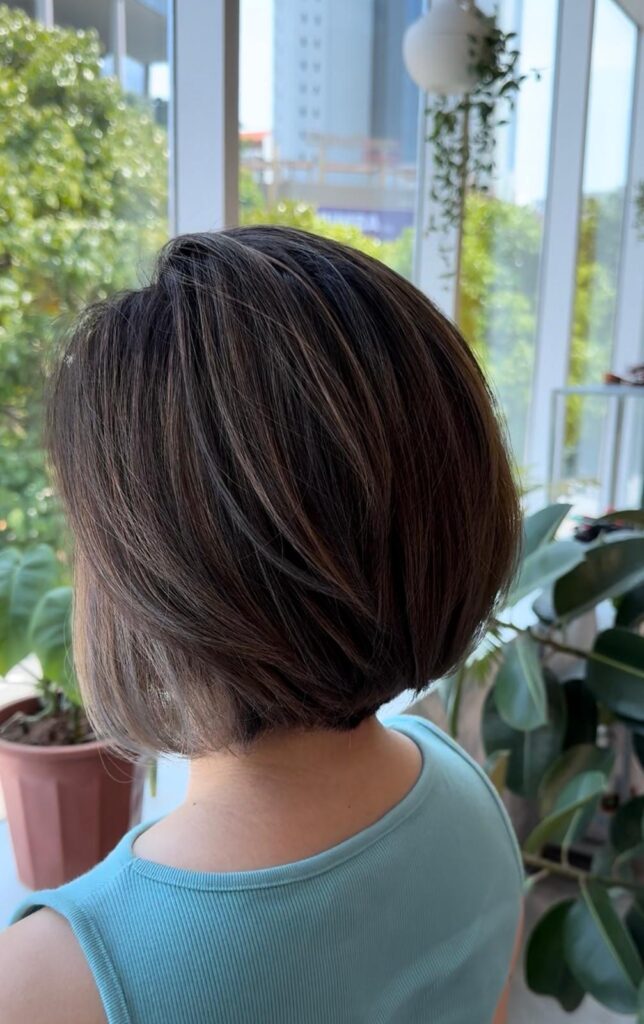Grey Blending Bob | Japanese Hair Salon Singapore 1 Grey blending bob hairstyle with highlights and plex protection to softly blend white hair at Japanese Hair Salon Singapore near Clarke Quay Chinatown creating natural dimension