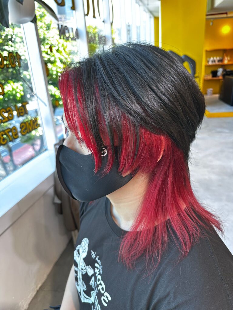 Red inner color with bleach contrast design by Creative Manager Issey at Colors Japanese Hair Salon Singapore near Clarke Quay Chinatown Singapore