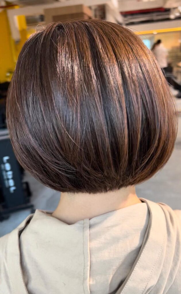 Graduated bob grey coverage hair color with natural shine at Japanese Hair Salon Singapore near Clarke Quay Chinatown precise bob haircut for a clean rounded silhouette
