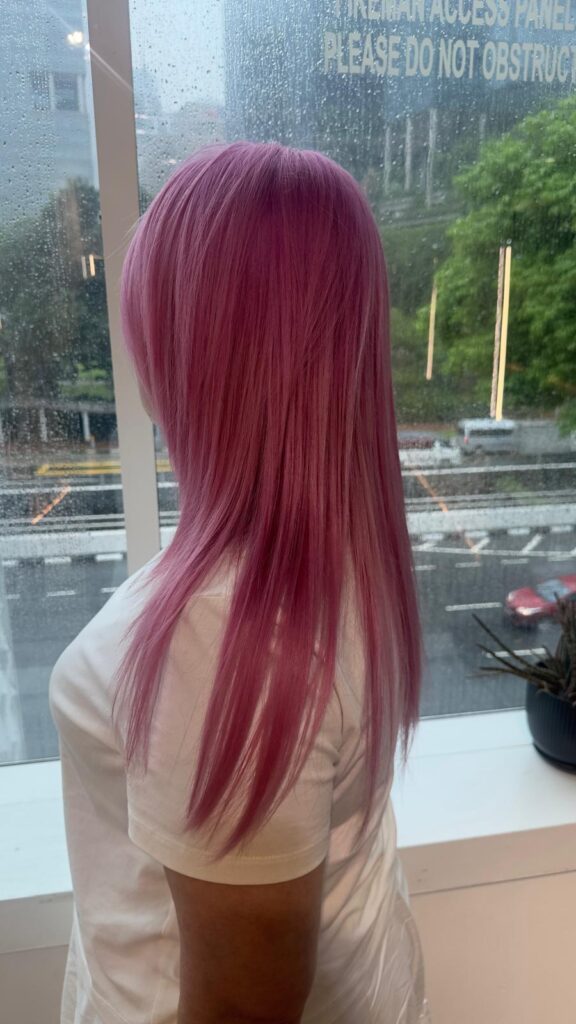 Pale pink hair color with bleach and plex protection pastel tone by Stylist Sylvia at Japanese Hair Salon Singapore near Clarke Quay Chinatown creating soft pastel pink hair