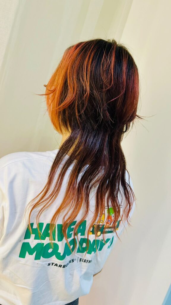 Japanese Jellyfish Cut with vivid orange design color, high layered haircut, low damage bleach, creative hair color at Japanese Hair Salon Singapore
