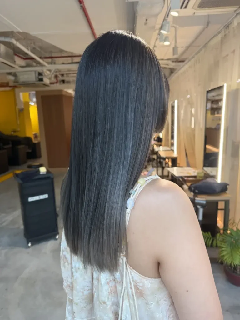 Singapore AirTouch Balayage transforming warm red hair into a cool silver gradient with Plex Bleach and Hime Bangs by Japanese Colorist Ura.