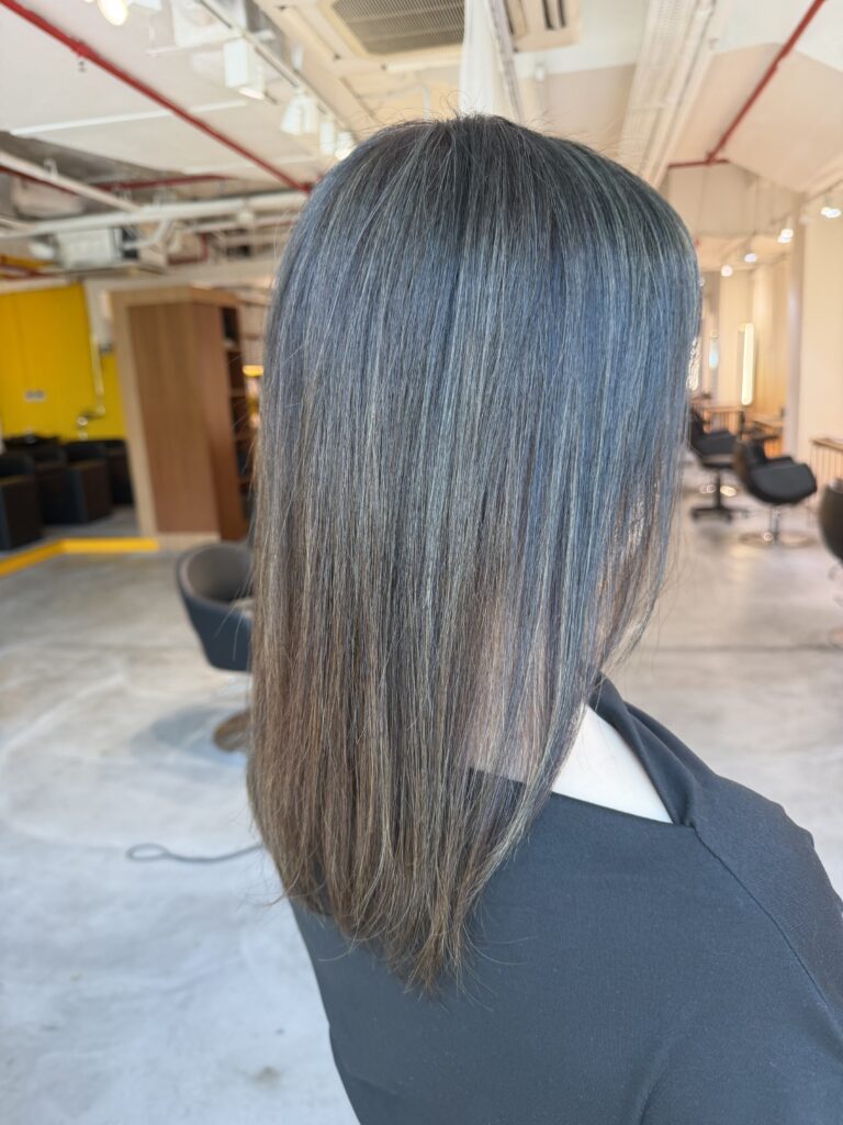 Home Hair Color Correction for a Medium Bob in Singapore 1 Correcting self-applied black grey dye on a medium bob in Singapore using low-damage bleach highlights with Plex, multiple toning formulas and BYKARTE treatment.