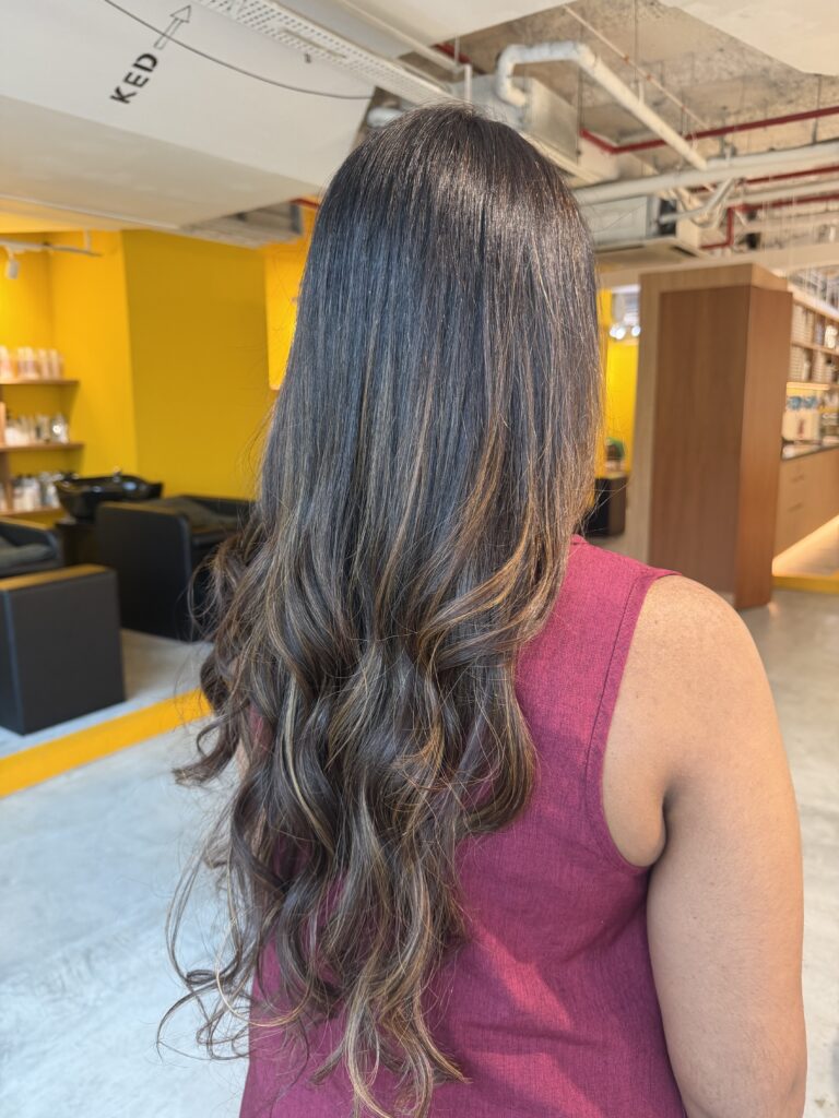 Dark Brown Grey Coverage Retouch for Super Long Layered Hair in Singapore 1 Super long layered hair with dark brown grey coverage retouch, surface layers for soft volume, and occasional bleach highlights maintenance to keep brightness, finished with Plex-supported color, Hoyu treatment and scalp cleansing spa in Singapore.
