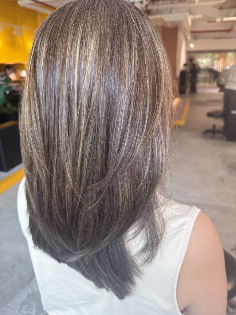 Beige Ash Grey Blending Highlights for Medium Hair in Singapore 1 Medium low-layer haircut with beige ash grey blending highlights, smooth straight texture and natural grey blending at a Japanese hair salon in Singapore.