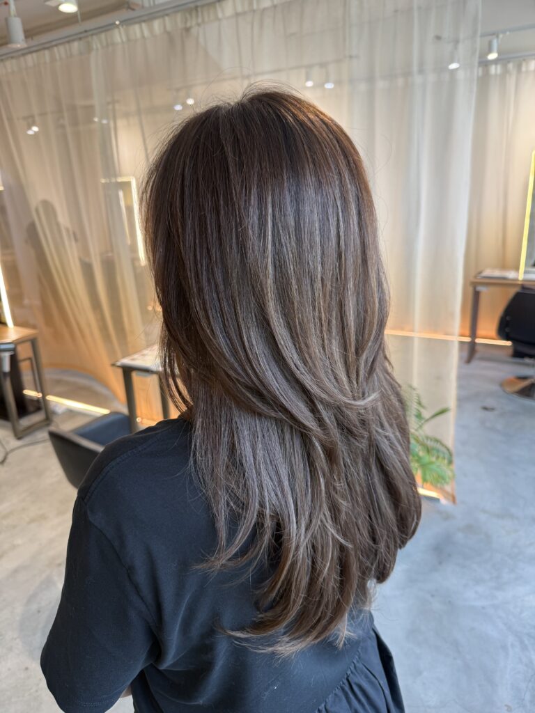 Ash Brown Grey Coverage for Long High-Layer Hair in Singapore 1 Long high-layer hair with ash brown grey coverage, soft volume and movement, created with Plex color at a Japanese hair salon in Singapore.