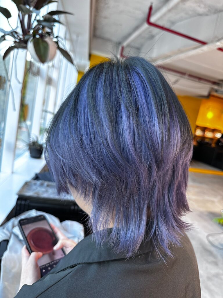 Singapore Light Purple Hair Color | Full Bleach & Layered Wolf Cut 1 Singapore Light Purple Hair Color with full bleach, soft lavender tones, medium layered wolf cut, Plex Bleach, and HOYU Ash Shampoo maintenance by Stylist Issey.