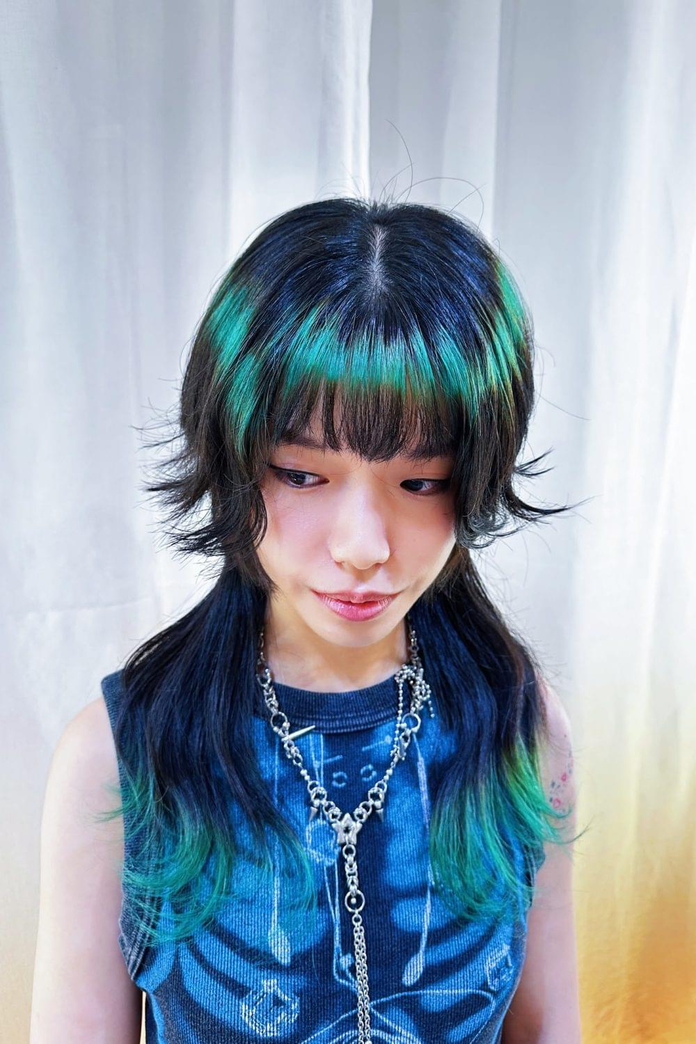 Jellyfish Cut with Emerald Green Bleach Design at Japanese Hair Salon Singapore. High layer haircut with ring color, dip color, Plex bleach, and face-framing bangs.