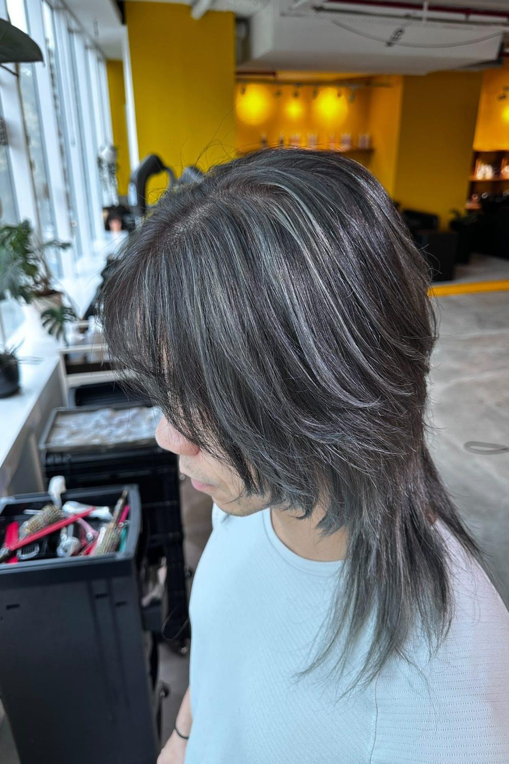 Unisex High Layer Cut with Silver Highlights at Japanese Hair Salon Singapore. Dark silver base with light silver highlights created using low-damage Plex bleach.