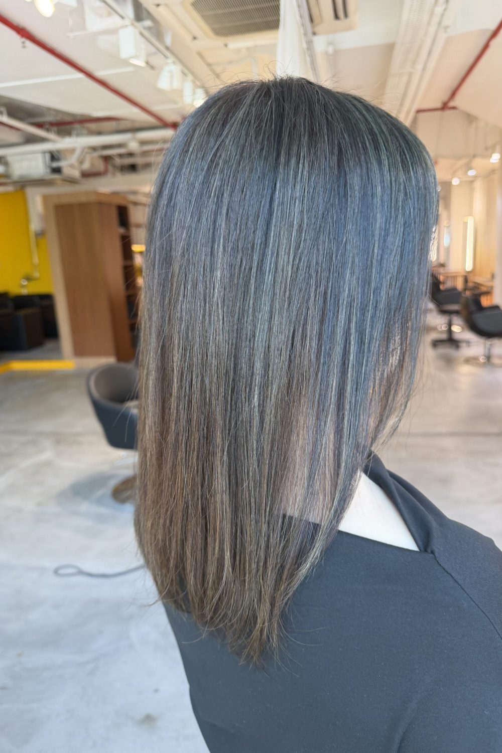Correcting self-applied black grey dye on a medium bob in Singapore using low-damage bleach highlights with Plex, multiple toning formulas and BYKARTE treatment.
