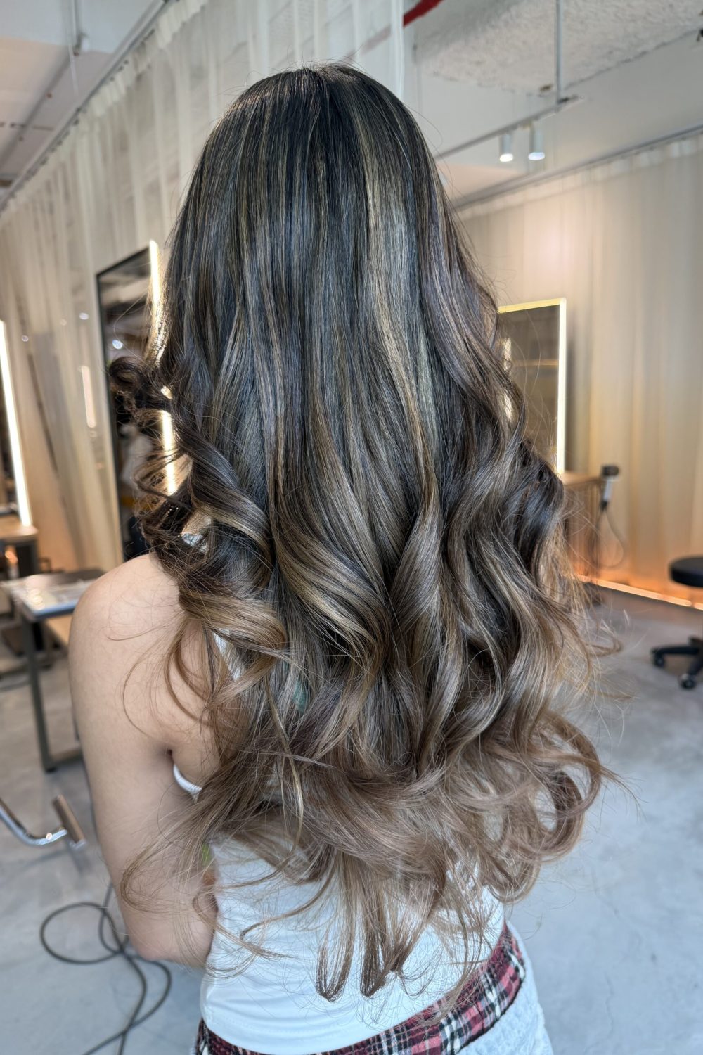 AirTouch blonde gradient hair color in Singapore with low-damage plex bleach, natural root blend, and long layered haircut at a Japanese hair salon.