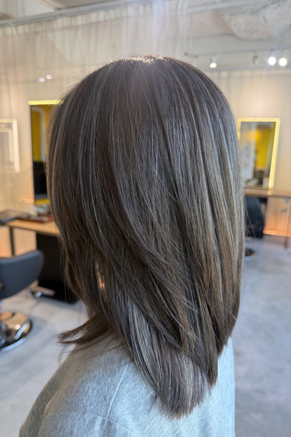 Grey blending ash hair color on medium layered hair in Singapore for softer grey coverage and low-damage maintenance at a Japanese hair salon.